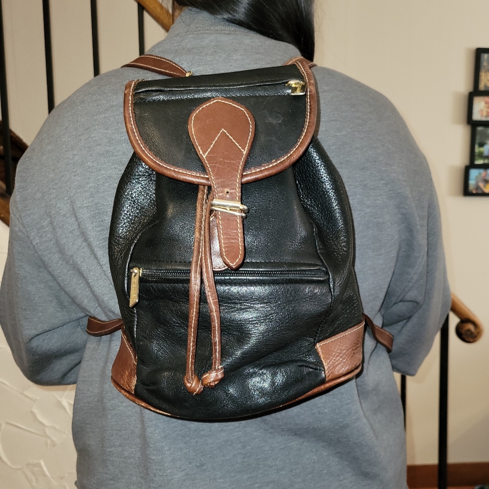 Vintage small black leather backpack